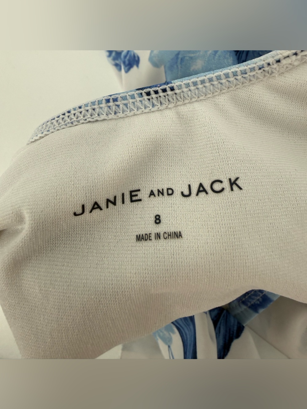 Janie and Jack Blue and White Floral One-Piece Swimsuit with Cream Flower - Picture 6 of 7